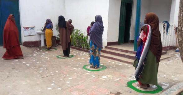 In light of COVID-19, health facilities have implemented new measures to separate people while seeking services such as controlled patient pathways from one area to the next. A key feature has been to include ample hand washing stations. SHACDO has been raising awareness about the importance of proper hand and cough hygiene in combination with demonstration hand washing classes for both staff and patients. Somalia. Photo: Concern Worldwide