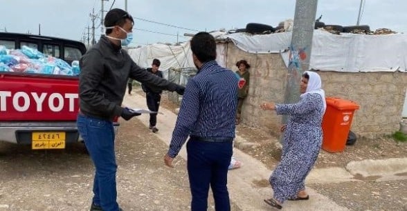 Distribution of Covid-19 prevention hygiene kits at Khankay IDPs camp Dohuk, Kurdistan Region, Iraq.