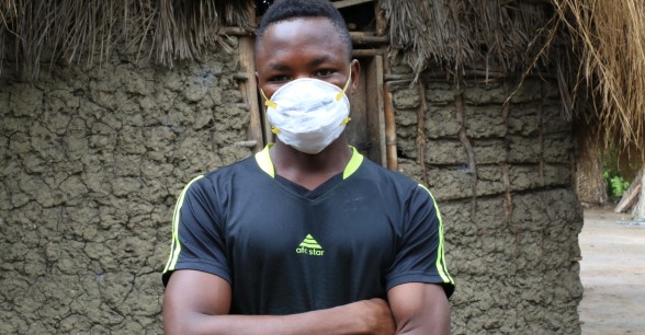 Daddy Mansaray wearing a mask as a preventative measure against Covid-19, Sierra Leone. Photo: Mohamed Saidu Bah