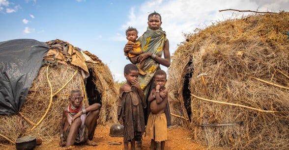 Ng’ikario Ekiru feeds her family with wild desert fruit and roasted animal hides as they experience the second drought in three years. Photo: Gavin Douglas