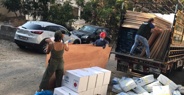 Concern team distributing shelter kits to communities affected by the blast. Photo: Pauline Coste / Concern Worldwide