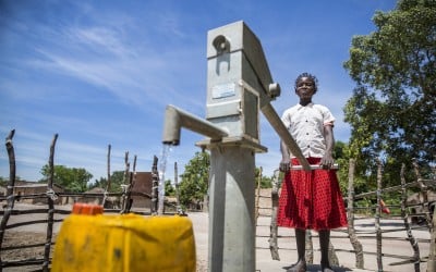 15 year old Liliana Mwenza wa llunga says the new water point and other interventions by the Concern-led WASH consortium in her village, Mulombwa, has had a very positive impact on family life. DRC. Photo: Kieran McConville/ Concern Worldwide