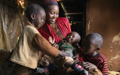 After Nasibo Asuran gave birth to her eight-month-old daughter, Ramah – a Concern trained community health volunteer – was sent to ensure that her baby had a healthy start to life. Kenya. Photo: Peter Caton/Concern