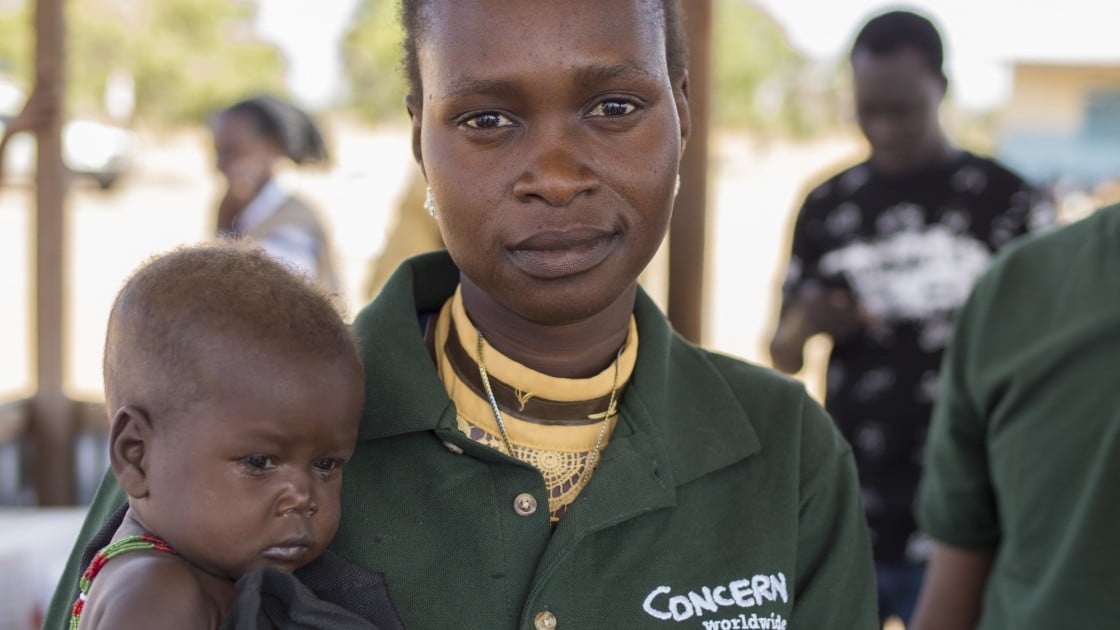 14 month old Chan Adim Garang and Monica Mawien. Photo: Kieran McConville/Concern Worldwide