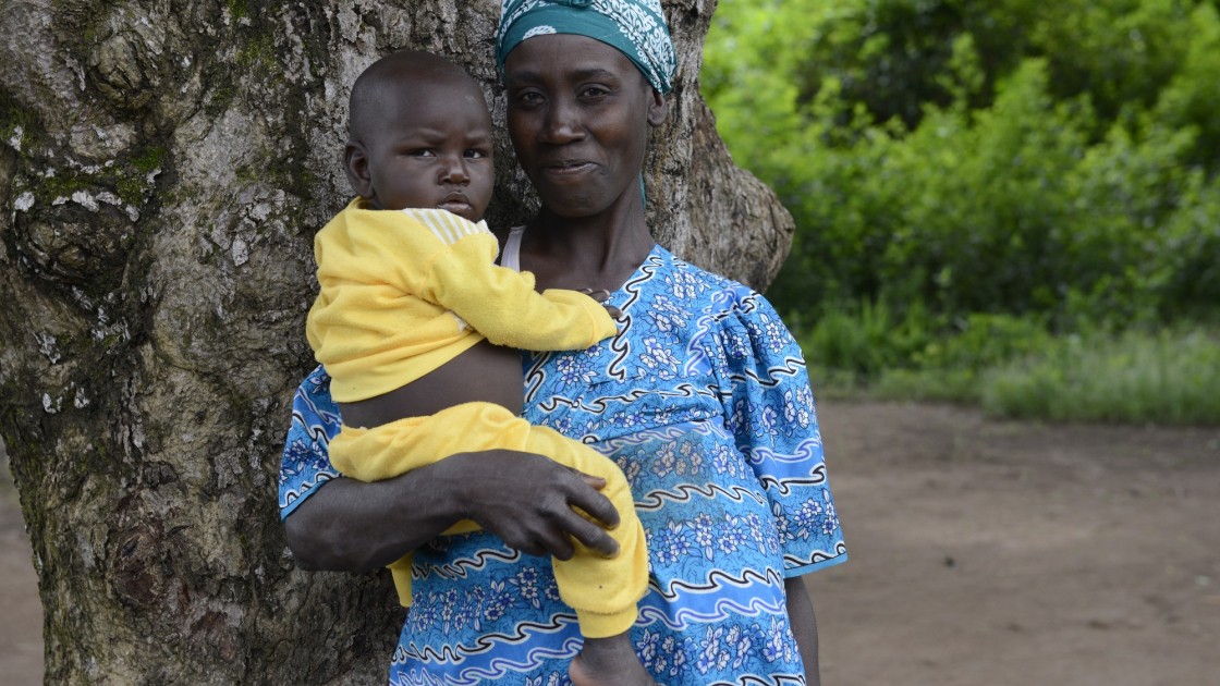 Jabelle Yafiti with her daughter, Aime-Lazara (16 months) who was malnourished but has recovered after receiving treatment at the Concern supported Boudouli Heath Post. Photo: Chris de Bode