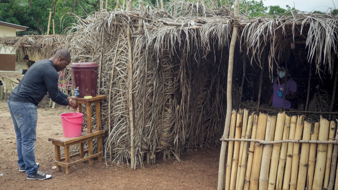A screening area and hand washing station were part of the infection prevention control during the Ebola outbreak in Sierra Leone.