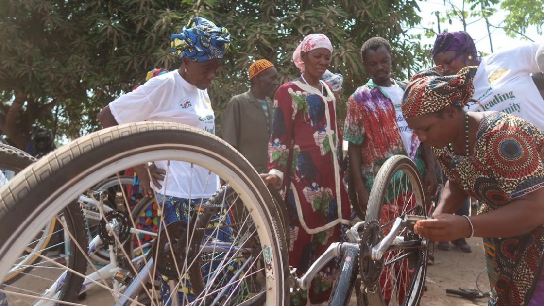 Influential women and traditional healers bicycle maintenance training session.