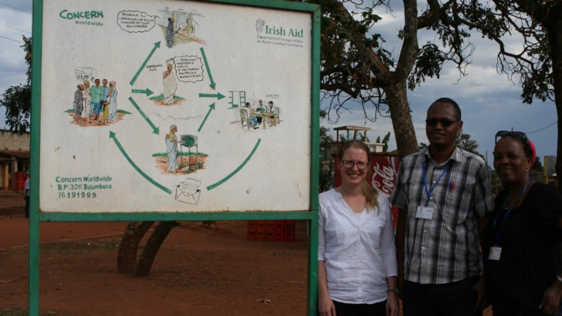 Jenny Swatton Claver Kubuhungu and Felicite Ndikiyuro at the CRM sign. Photographer: Rosaleen Martin