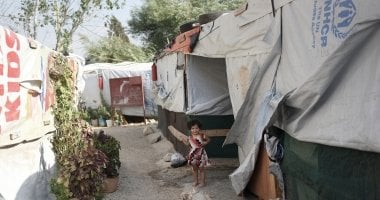 The tented encampment which is home to *Mohamad and his family, which has been kitted out with water tanks and insulation for the winter, by Concern, in Northern Lebanon. Photograph by Mary Turner