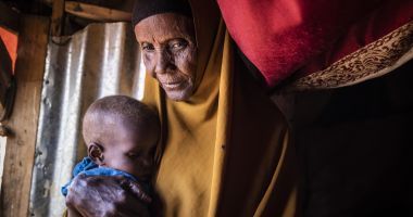 Samiro with her grandchild, Calaso at a settlement for internally displaced people, near Baidoa, Somalia. (Photo: Ed Ram/Concern Worldwide