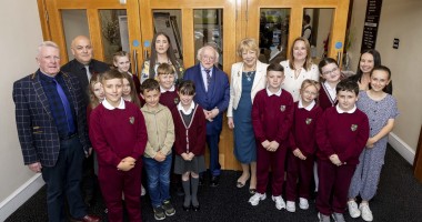 Pupils and teachers from Bunscoil Mhic Reachtain with Irish President Michael D Higgins and Sabina Higgins and Concern's Amelia Deehan