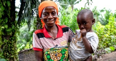 Woman holding her child 