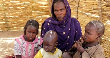 Woman in Chad with three young children