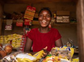 Eliza Manjolo in her shop in Nsanje, Malawi. Eliza took part in Umodzi training. Photo: Chris Gagnon/Concern Worldwide