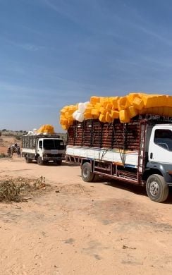 A truck carries aid supplies