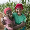 Esime and her husband Oofa now have enough food for their family, thanks to climate-smart agricultural training. Photo: Kieran McConville