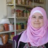 Bushra runs a small grocery shop after receiving training and a grant from Concern.