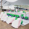 Concern staff members organise the distribution of household and hygiene kits. Photo: Samuel Isenge/Concern Worldwide