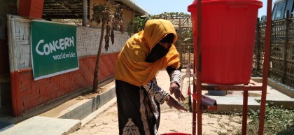 Kona* washes her hands as a preventative measure to the spread of Covid-19 Photo: AKM Jakaria 