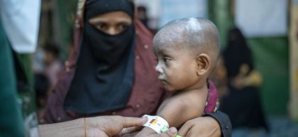 Kulsum* (28) a Rohingya mother visits Concern nutrition centre with her fourth child (15 months) for health examination and to receive ready-to-use therapeutic food (RUTF) in the nutrition centre at Camp 19, Rohingya camp, Ukhiya, Cox's bazar. Photo: Saikat Mojumder/Concern Worldwide