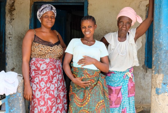Pregnant woman with family