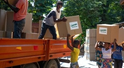 Workers load up trucks with supplies for the areas of the Nsanje Region worst affected by Cyclone Idai. Malawi. Photo: Gavin Douglas / Concern Worldwide.