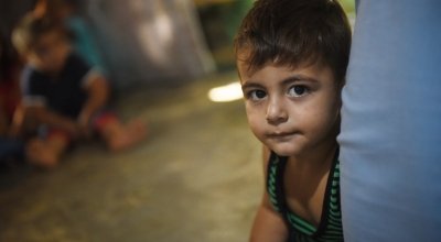 *Mohamad's son *Khaled, 3, pictured in the family home which has been kitted out by Concern with toilets, water tanks, blankets and insulation for the winter, by Concern, in Northern Lebanon. Photograph by Mary Turner