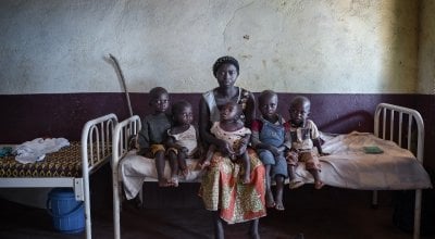 Isabelle and her sons, who are all are acutely malnourished. Photo: Chris de Bode