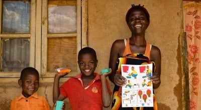 Shyreen and her sons after receiving soap from Concern's team in Malawi