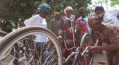 Influential women and traditional healers bicycle maintenance training session.