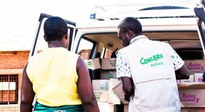 Concern employee Socrates distributing soap to Health Surveillance Assistants in Malawi. Photo: Concern Worldwide