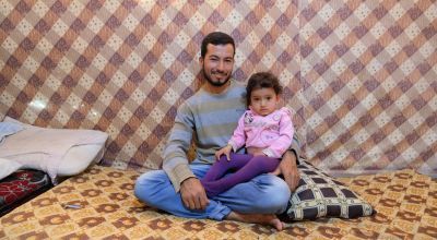 Khalid is pictured with his two-year-old daughter, Lebanon. Photo: Darren Vaughan