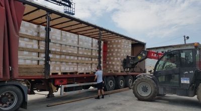 Staff load trucks with food and hygiene kits to send to distribute to flood-affected evacuees. Photo: Concern Worldwide