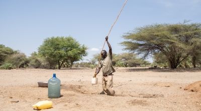 Joseph Ikitela fetches water from a hand-dug well that his community is currently relying on in Northern Kenya’s Moruongor village in Turkana County. Photo: Lisa Murray/Concern Worldwide