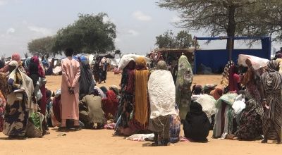 Sudanese refugees in Adré camp, waiting for a WFP food distribution. Photo: Leo Roozendaal/Concern Worldwide