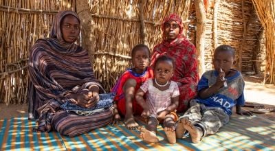 Didja, her sister and her children in a refugee camp in Chad 