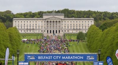 View from above of crowds running the Belfast Marathon