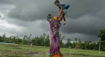 Once displaced by flooding, Sumi's family has now returned to her native village thanks to the flood-resistant housing. Photo: Saikat Mojumder/Concern Worldwide