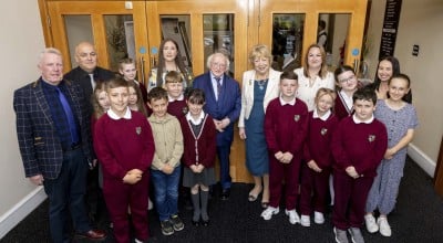 Pupils and teachers from Bunscoil Mhic Reachtain with Irish President Michael D Higgins and Sabina Higgins and Concern's Amelia Deehan