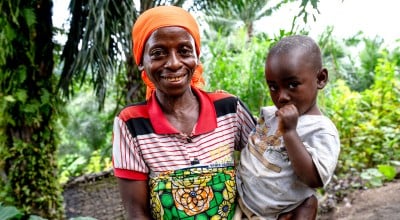 Woman holding her child 