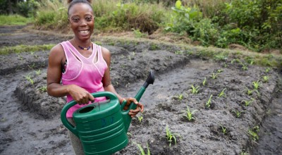 Assanatu at her farm plot on a rehabilitated swamp near her home in Magborkorr, Sierra Leone. Assanatu is also Secretary of the local VSLA. Photo: Kieran McConville/Concern Worldwide.