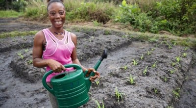 Assanatu at her farm plot on a rehabilitated swamp near her home in Magborkorr, Sierra Leone. Assanatu is also Secretary of the local VSLA. Photo: Kieran McConville/Concern Worldwide.
