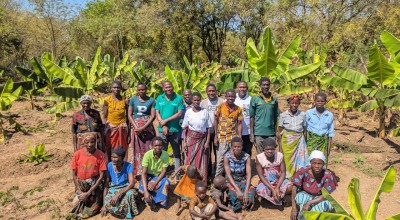 Concern Malawi Team standing with banana sucker recipients in Traditional Authority Ndamera in Nsanje District. Photo: Concern Worldwide.