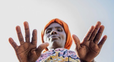 Participant demonstrates the importance of soap-making for handwashing, DRC. Photo: Concern Worldwide.
