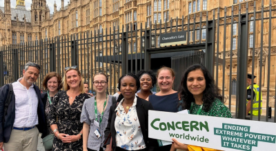 Members of Concern Worldwide stand outside of Parliament