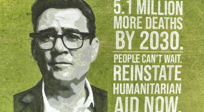 Andy Burnham's face drawn in paint on a field next to text warning of 5.1 million deaths by 2030