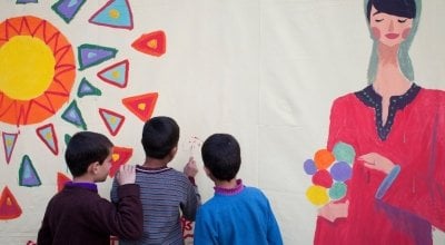 Refugees from Syria take part in an art workshop at a Concern supported Collective Centre in Northern Lebanon. Photo: Abbie Trayler-Smith/Concern Worldwide.