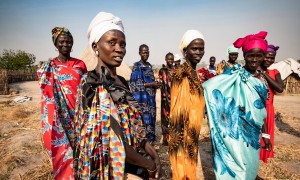 A volunteer network of local women in Gandor, Leer District, South Sudan, participate in a mental health peer support group, preaching the benefits of antenatal checks and good hygiene to help cut child deaths and maternal deaths in childbirth. Simon Townsley/Panos Pictures 2020.