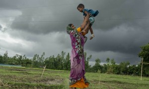 Once displaced by flooding, Sumi's family has now returned to her native village thanks to the flood-resistant housing. Photo: Saikat Mojumder/Concern Worldwide