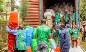 Concern staff members organise the distribution of household and hygiene kits as part of the SAFER programme, funded by FCDO. Photo: Samuel Isenge/Concern Worldwide